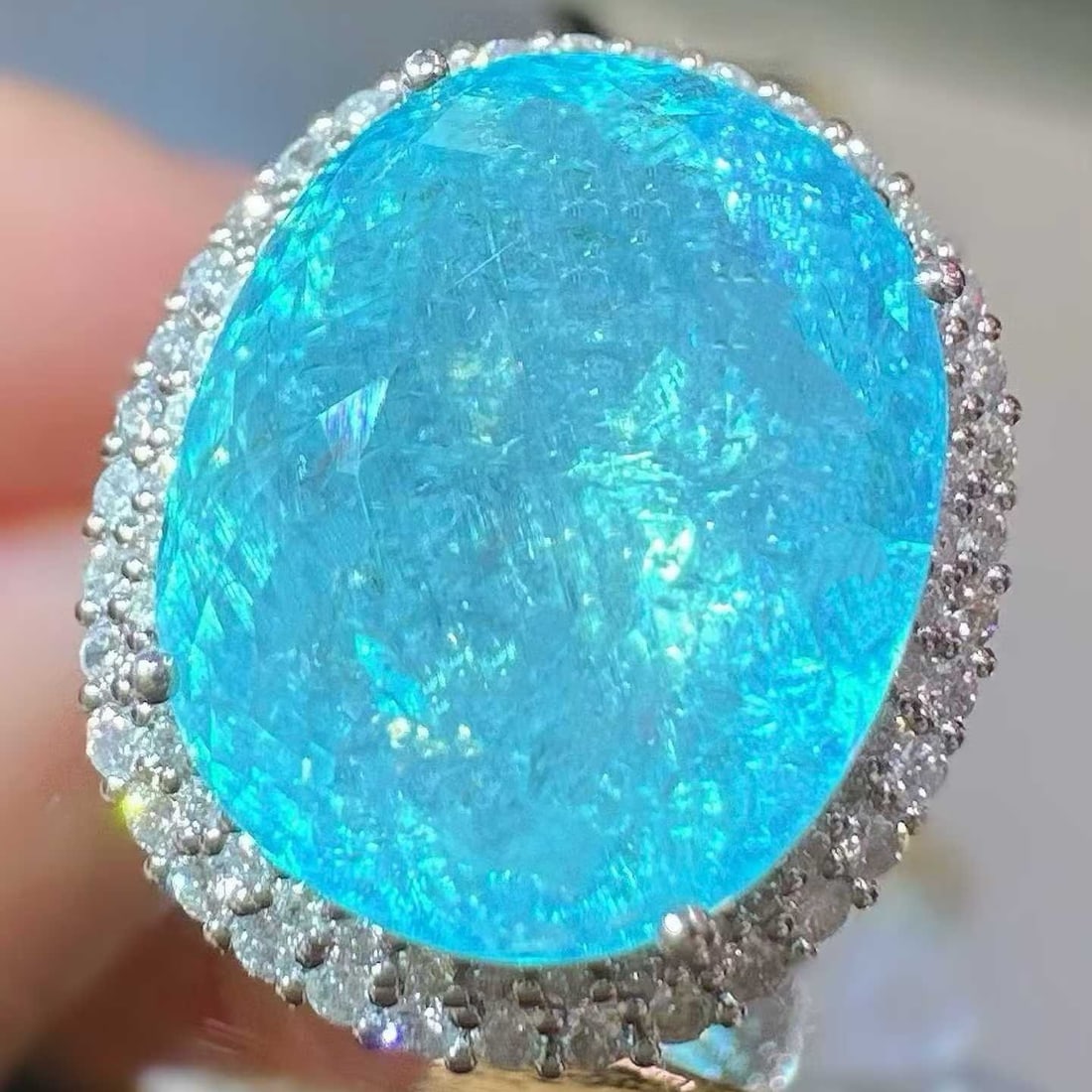 14k Gold 22.52 Ctw Natural Paraiba Tourmaline & Diamond Ring/pendant( Without Chain ): Ref:231151018 // gold content:14k gold // ring size:7. 25us // // main gemstone:paraiba tourmaline // shape:oval // carat weight:21. 2ct // color:blue // treatment:natural // // adjacent gemstone 2 : 