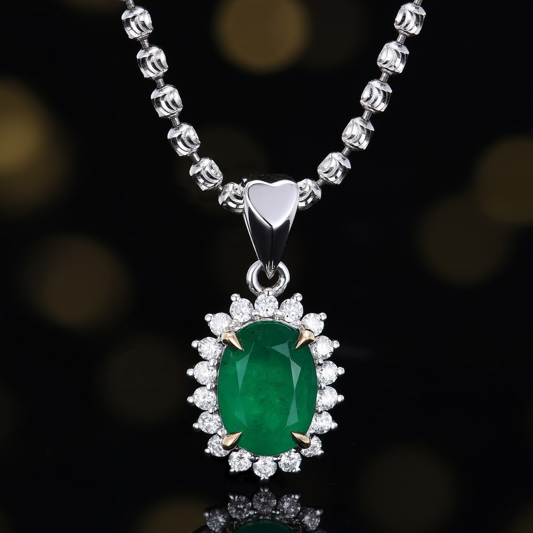 14k Gold 1.28 Ctw Natural Emerald & Diamond Pendant( Without Chain ): Ref:231151079 // gold content:14k gold // main gemstone:emerald // shape:oval // carat weight:1. 1ct // color:green // treatment:natural // // adjacent gemstone 2 : diamond // number of stones:18 //