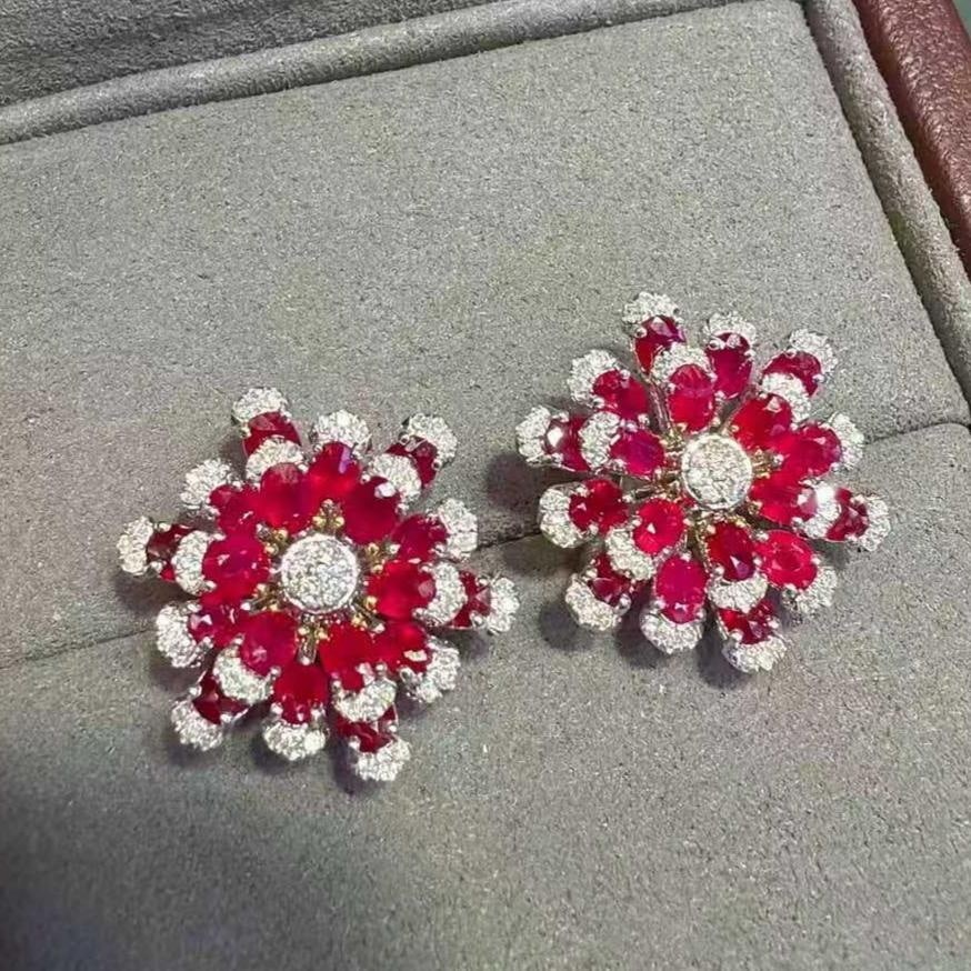 14k Gold 3.43 Ctw Natural Ruby & Diamond Earrings: Ref:231151153 // gold content:14k gold // main gemstone:ruby // shape:oval // carat weight:3. 06ct // color:red // treatment:natural // // adjacent gemstone 2 : diamond // shape:round // carat