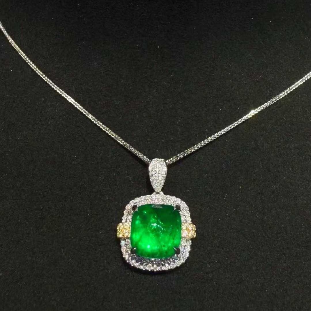 14k Gold 2.86 Ctw Natural Emerald & Diamond Pendant( Without Chain ): Ref:231151197 // gold content:14k gold // main gemstone:emerald // shape:sugar-loaf // carat weight:2. 6ct // color:green // treatment:natural // // adjacent gemstone 2 : diamond // shape:round //