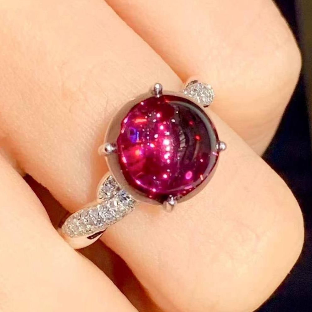 14k Gold 3.5 Ct Natural Tourmaline & Diamond Ring: Ref:231151230 // gold content:14k gold // ring size:7. 25us // // main gemstone:tourmaline // shape:round // carat weight:3. 5ct // color:red // treatment:natural // cut grade:g // // adjacent