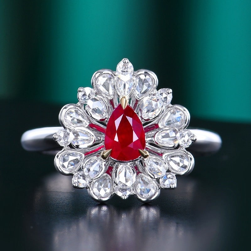 14k Gold 1.02 Ctw Natural Ruby & Diamond Ring: Ref:231152021 // gold content:14k gold // ring size:7. 25us // // main gemstone:ruby // shape:pear // carat weight:0. 66ct // color:pigeonblood red // treatment:natural // // adjacent gemstone 2 :