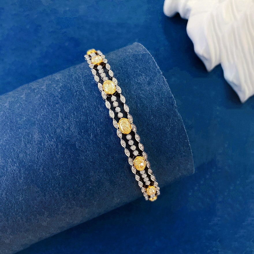 14k Gold 3.90 Ctw Natural Yellow Diamond & Diamond Bracelet: Ref:231152041 // gold content:14k gold // main gemstone:yellow diamond // shape:oval // carat weight:3. 00ct // color:yellow // treatment:natural // // adjacent gemstone 2 : diamond // shape:round //