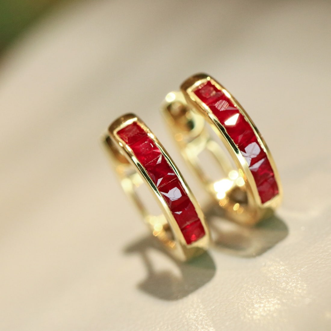 14k Gold 0.68 Ct Natural Ruby Earrings: Ref:231152086 // gold content:14k gold // main gemstone:ruby // shape:princess // carat weight:0. 68ct // color:red // treatment:natural // High Estimate: 3000 Condition: New Low Estimate: 2000