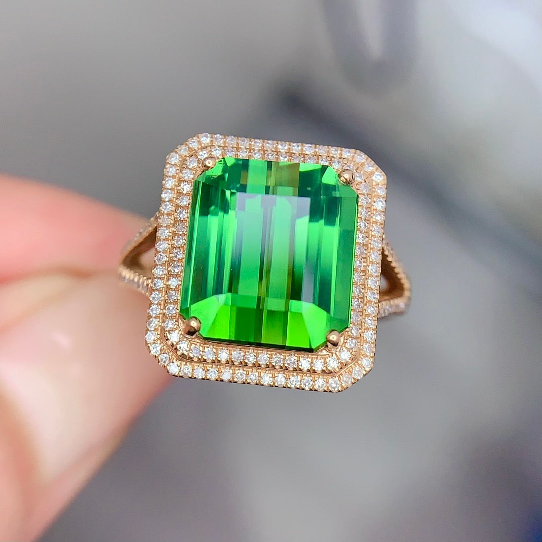 14k Gold 7.02 Ct Natural Tourmaline & Diamond Ring: Ref:231152137 // gold content:14k gold // ring size:7. 25us // // main gemstone:tourmaline // shape:octagonal // carat weight:7. 02ct // color:green // treatment:natural // // adjacent gemstone 2 :