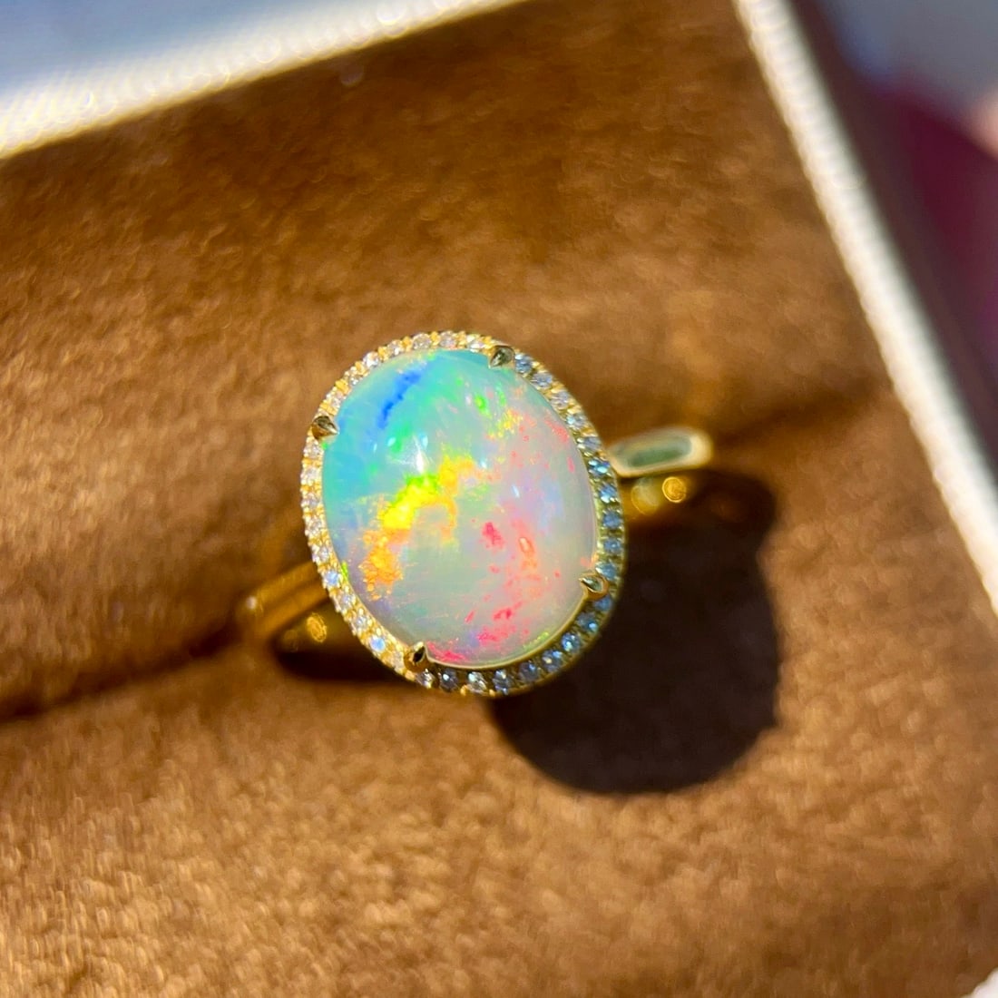 14k Gold 2.21 Ctw Natural Opal & Diamond Ring: Ref:231152170 // gold content:14k gold // ring size:7. 25us // // main gemstone:opal // shape:oval // carat weight:2. 1ct // color:color // treatment:natural // // adjacent gemstone 2 : diamond //