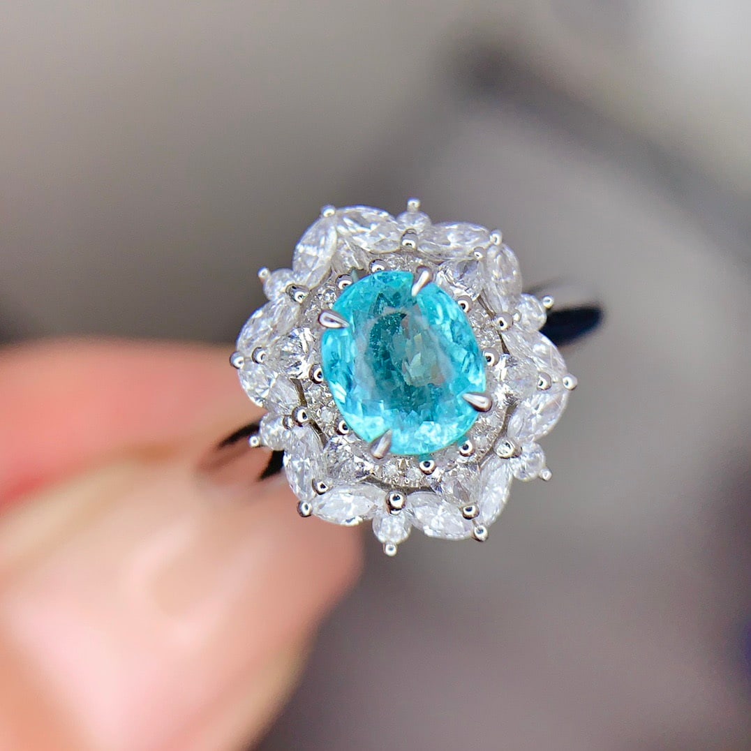 14k Gold 0.74 Ct Natural Paraiba Tourmaline & Diamond Ring: Ref:231152171 // gold content:14k gold // ring size:7. 25us // // main gemstone:paraiba tourmaline // shape:oval // carat weight:0. 74ct // clarity grade:vs2 // color:blue // treatment:natural // //