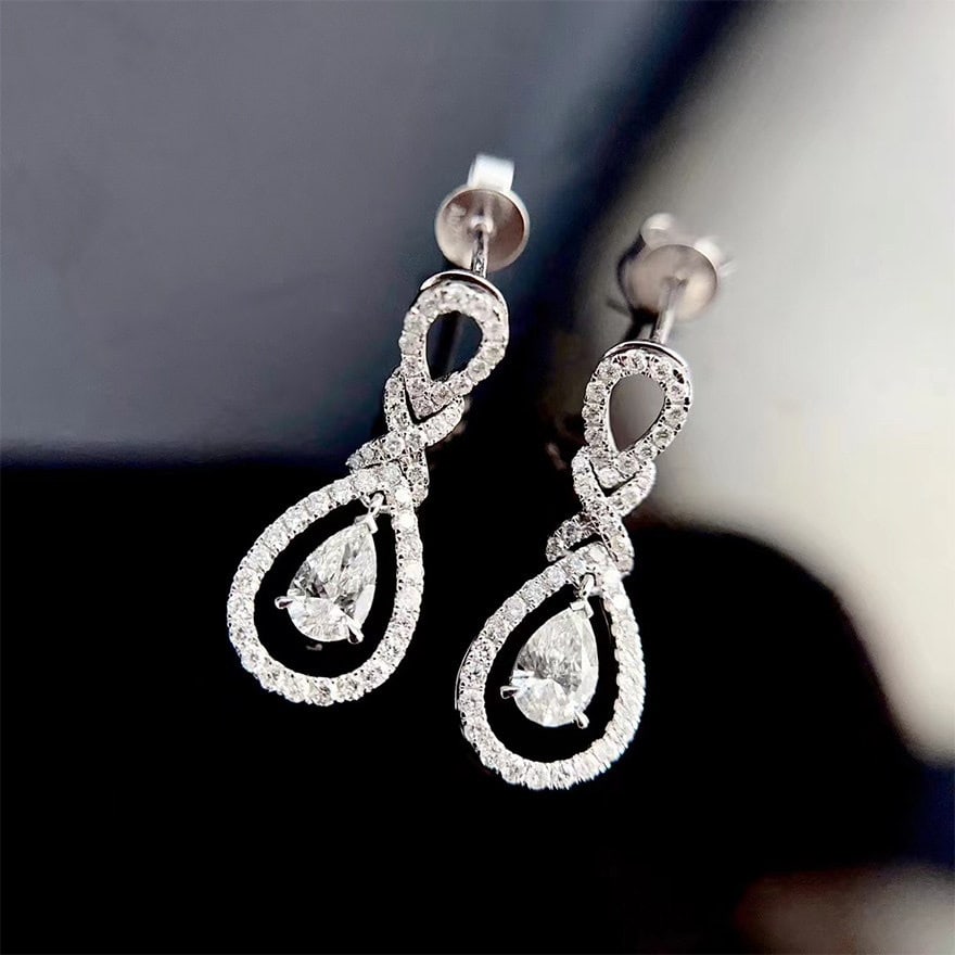 Gia Certified 14k Gold 0.82 Ctw Natural H Si1 Pear Diamond Earrings: Ref:231152174 // gold content:14k gold // main gemstone:diamond // certified:gia // shape:pear // carat weight:0. 3ct // clarity grade:si1 // color:h // treatment:natural // // adjacent gemstone 2 : d