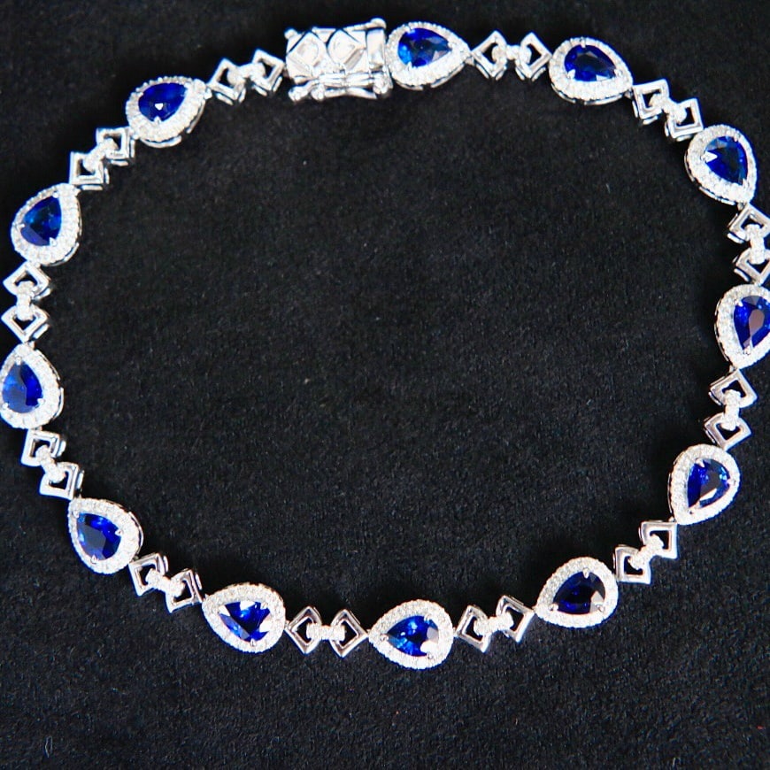 14k Gold 3.99 Ctw Natural Sapphire & Diamond Bracelet: Ref:231152179 // gold content:14k gold // main gemstone:sapphire // shape:pear // carat weight:3. 3ct // color:blue // treatment:natural // // adjacent gemstone 2 : diamond // shape:round // carat