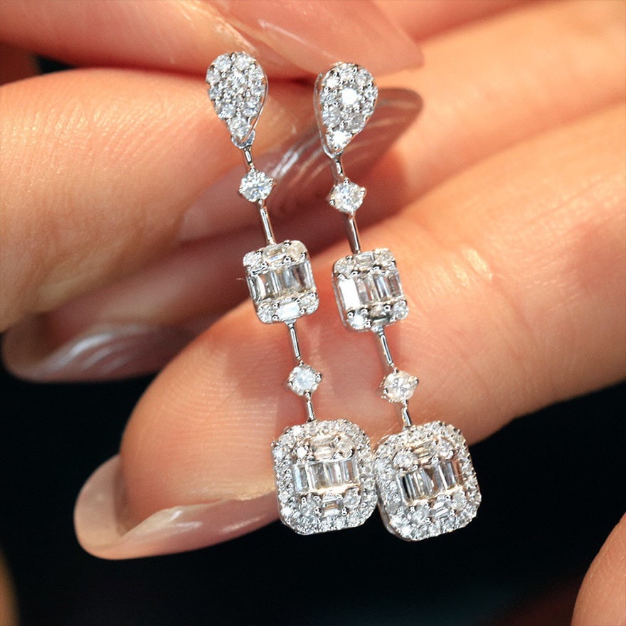 14k Gold 0.65 Ct Natural H Diamond Earrings: Ref:231152198 // gold content:14k gold // main gemstone:diamond // shape:multiple // carat weight:0. 65ct // clarity grade:vs-si // color:h // treatment:natural // High Estimate: 6300 Condition: New
