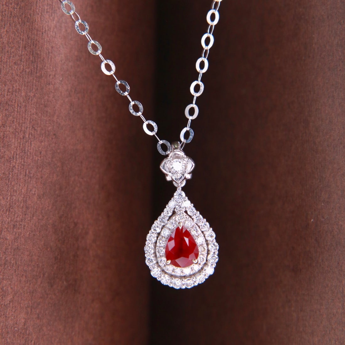 14k Gold 0.56 Ctw Natural Ruby & Diamond Necklace: Ref:231152217 // gold content:14k gold // main gemstone:ruby // shape:pear // carat weight:0. 35ct // color:red // treatment:natural // // adjacent gemstone 2 : diamond // shape:round // carat