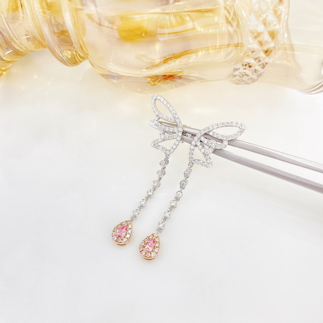 14k Gold 0.66 Ctw Natural Pink Diamond & Diamond Earrings: Ref:231152259 // gold content:14k gold // main gemstone:pink diamond // shape:pear // carat weight:0. 16ct // color:pink // treatment:natural // // adjacent gemstone 2 : diamond // shape:round //
