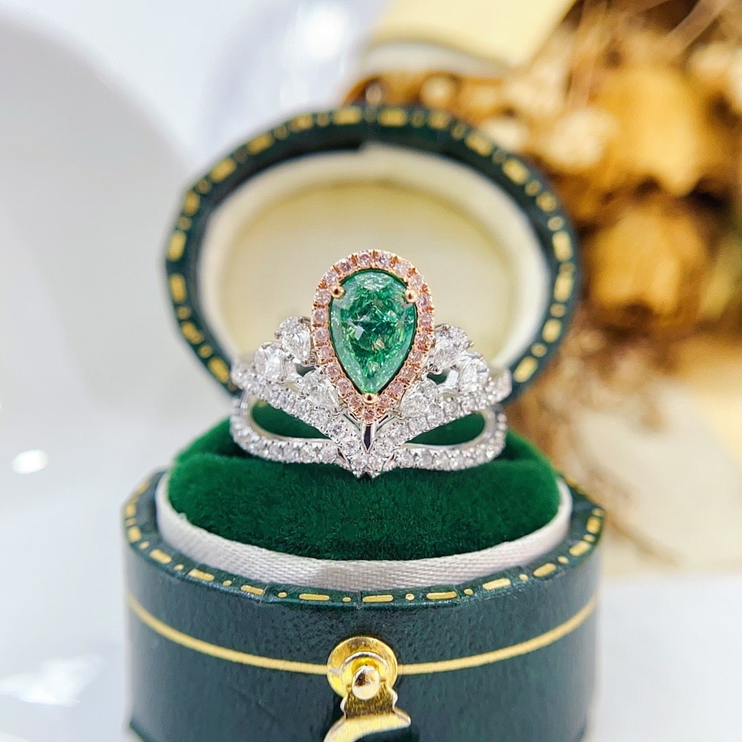 14k Gold 1.77 Ctw Natural Green Diamond & Diamond Ring: Ref:231152367 // gold content:14k gold // ring size:7. 25us // // main gemstone:green diamond // shape:pear // carat weight:1. 06ct // color:green // treatment:natural // // adjacent gemstone 2 :