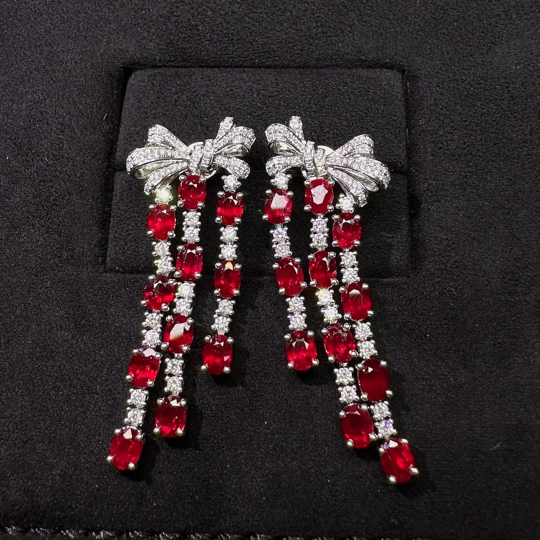 14k Gold 7.09 Ctw Natural Ruby & Diamond Earrings: Ref:231152384 // gold content:14k gold // main gemstone:ruby // shape:oval // carat weight:6. 2ct // color:red // treatment:natural // // adjacent gemstone 2 : diamond // shape:round // carat weight:0