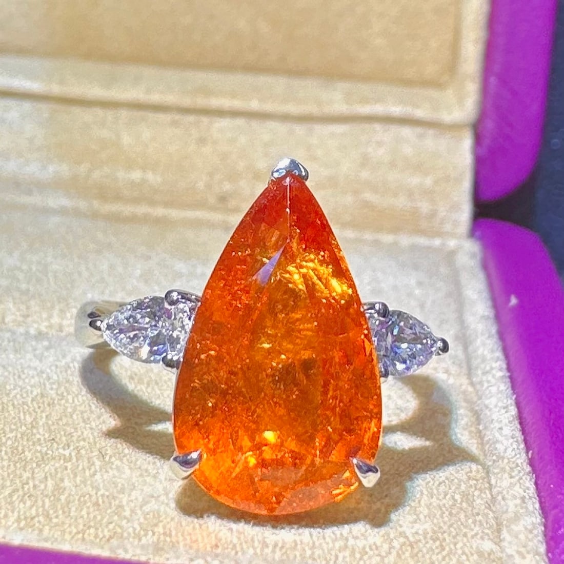 14k Gold 8.01 Ctw Natural Spessartine & Diamond Ring: Ref:231152408 // gold content:14k gold // ring size:7. 25us // // main gemstone:spessartine // shape:pear // carat weight:7. 65ct // color:orange // treatment:natural // // adjacent gemstone 2 :