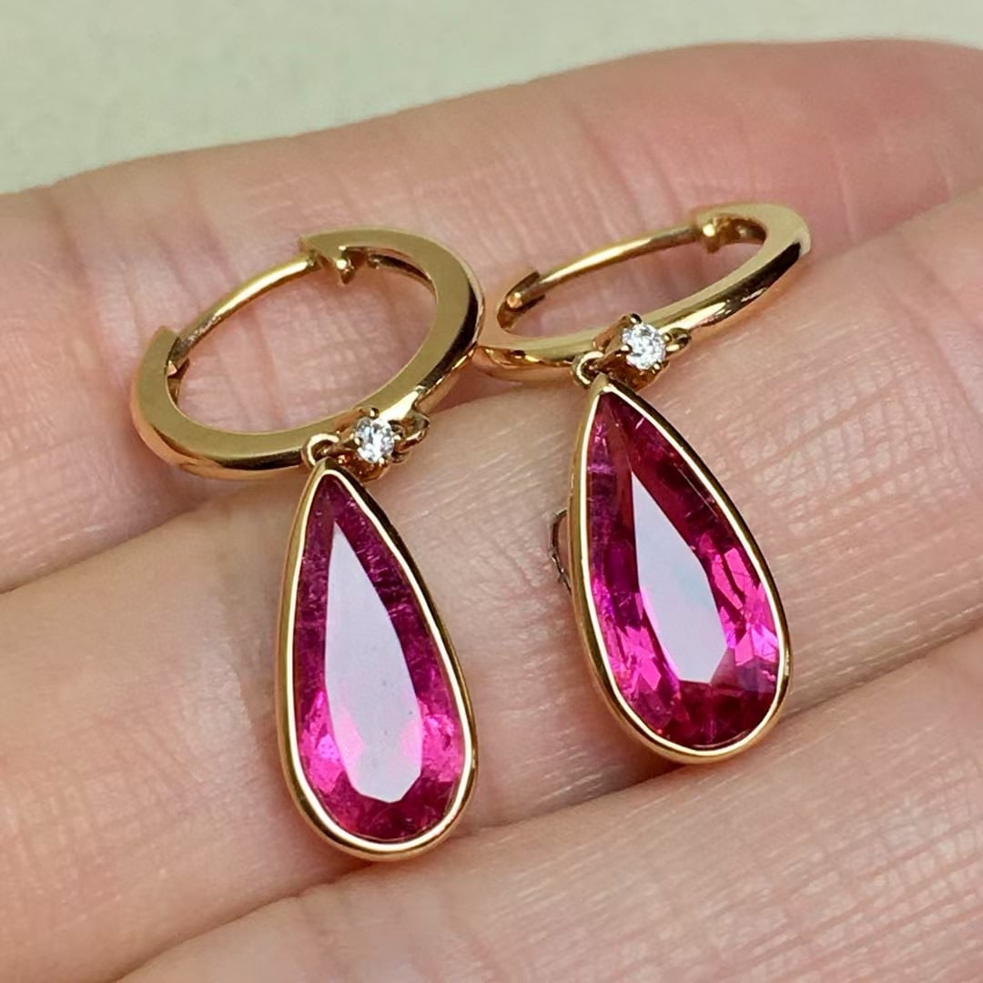 14k Gold 3 Ct Natural Tourmaline & Diamond Earrings: Ref:230989016 // gold content:14k gold // main gemstone:tourmaline // shape:pear // carat weight:3ct // color:red // treatment:natural // cut grade:g // // adjacent gemstone 2 : diamond // number of
