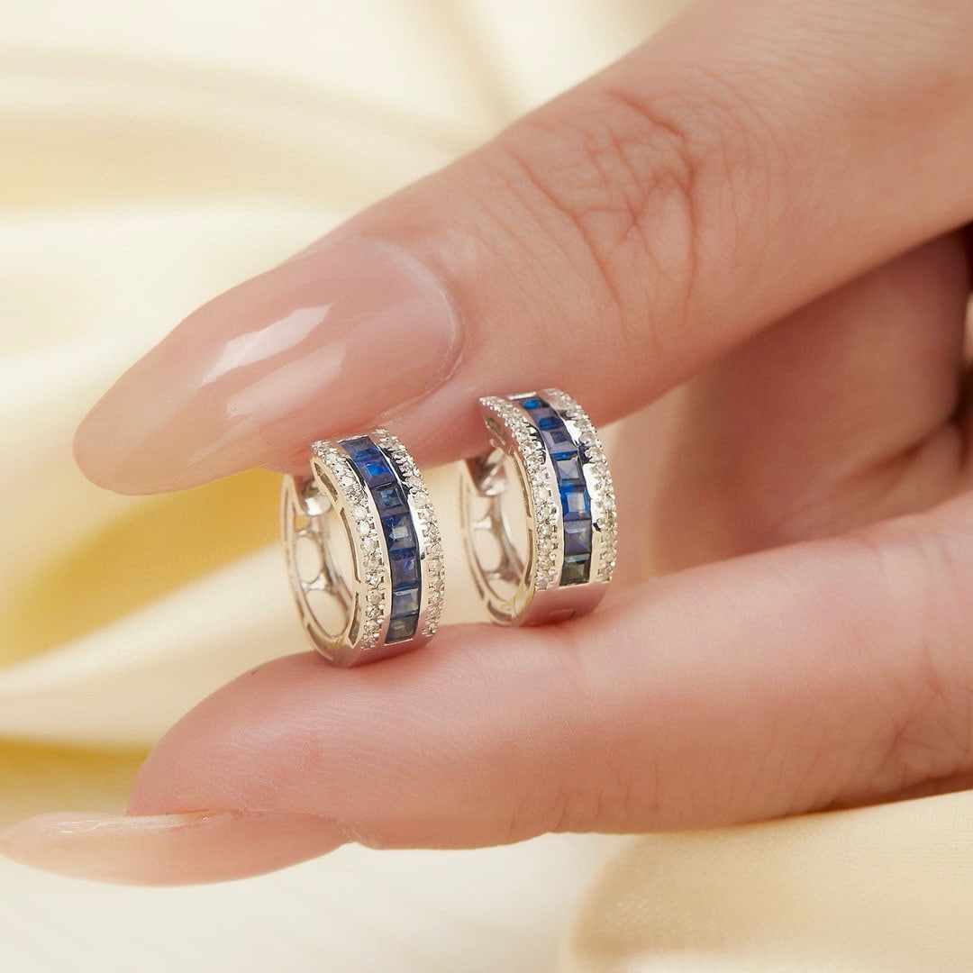 14k Gold 0.70 Ct Natural Sapphire & Diamond Earrings: Ref:230989055 // gold content:14k gold // main gemstone:sapphire // shape:emerald // carat weight:0. 70ct // color:blue // treatment:natural // cut grade:g // // adjacent gemstone 2 : diamond //