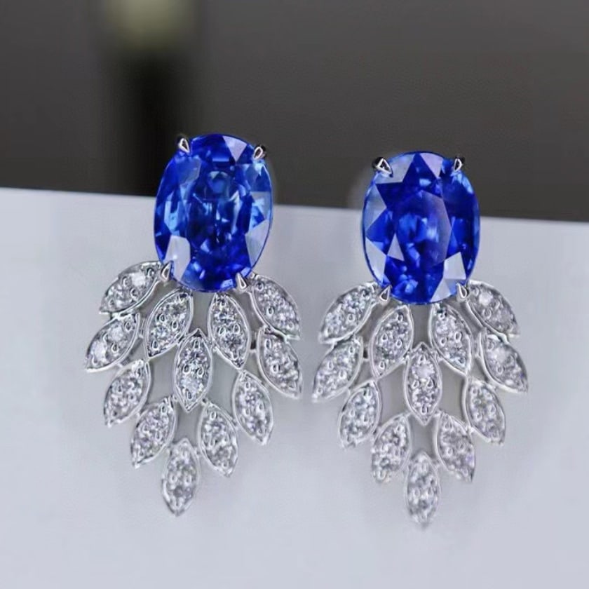 14k Gold 2 Ct Natural Sapphire & Diamond Earrings: Ref:230989146 // gold content:14k gold // main gemstone:sapphire // shape:oval // carat weight:2ct // color:blue // treatment:natural // cut grade:g // // adjacent gemstone 2 : diamond // shape:round