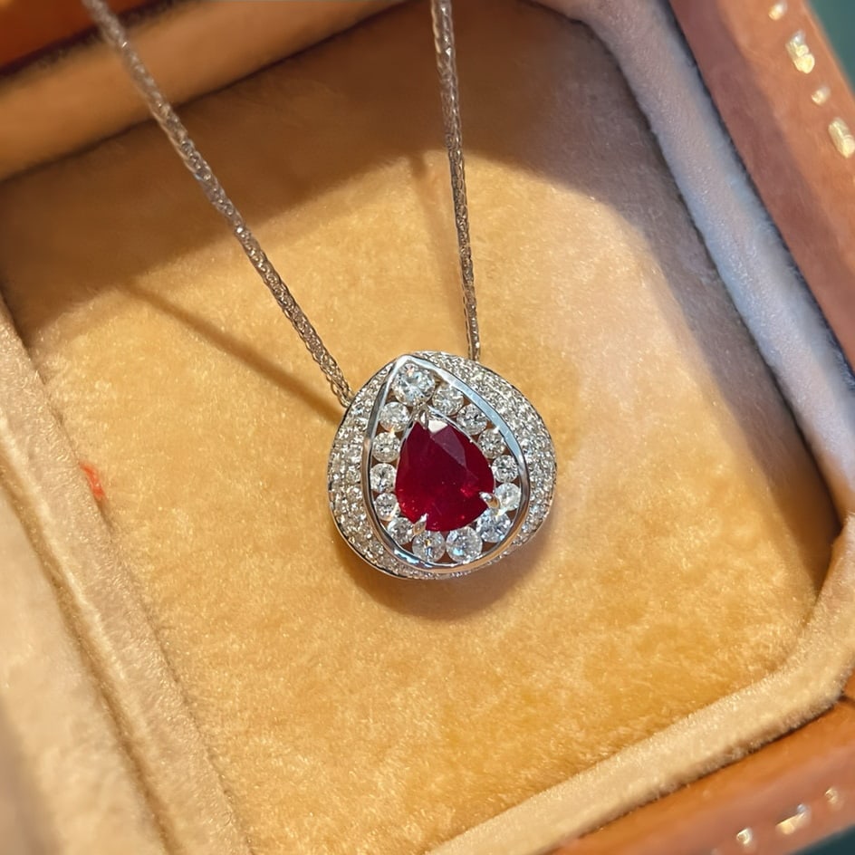 14k Gold 0.87 Ctw Natural Ruby & Diamond Pendant( Without Chain ): Ref:230989147 // gold content:14k gold // main gemstone:ruby // shape:pear // carat weight:0. 55ct // color:red // treatment:natural // cut grade:g // // adjacent gemstone 2 : diamond // shape:round