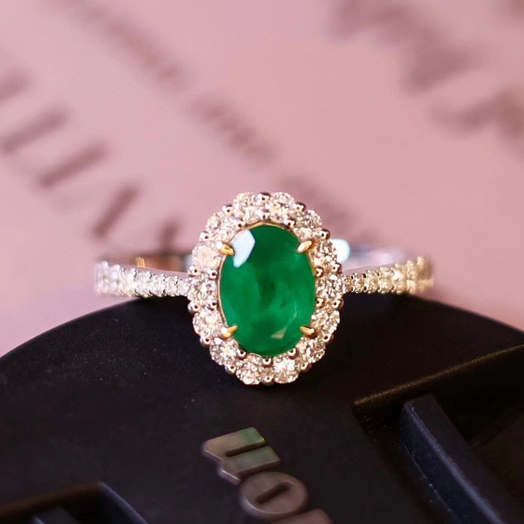 14k Gold 1.11 Ctw Natural Emerald & Diamond Ring: Ref:230989184 // gold content:14k gold // ring size:7. 25us // // main gemstone:emerald // shape:oval // carat weight:0. 71ct // color:green // treatment:natural // cut grade:g // // adjacent