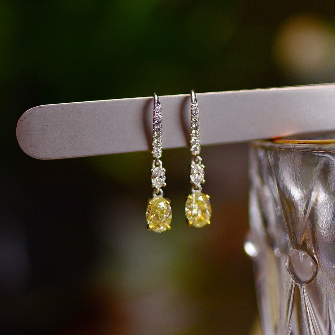 14k Gold 1.36 Ctw Natural Yellow Diamond & Diamond Earrings: Ref:230989248 // gold content:14k gold // main gemstone:yellow diamond // shape:oval // carat weight:1. 12ct // color:yellow // treatment:natural // cut grade:g // // adjacent gemstone 2 : diamond //
