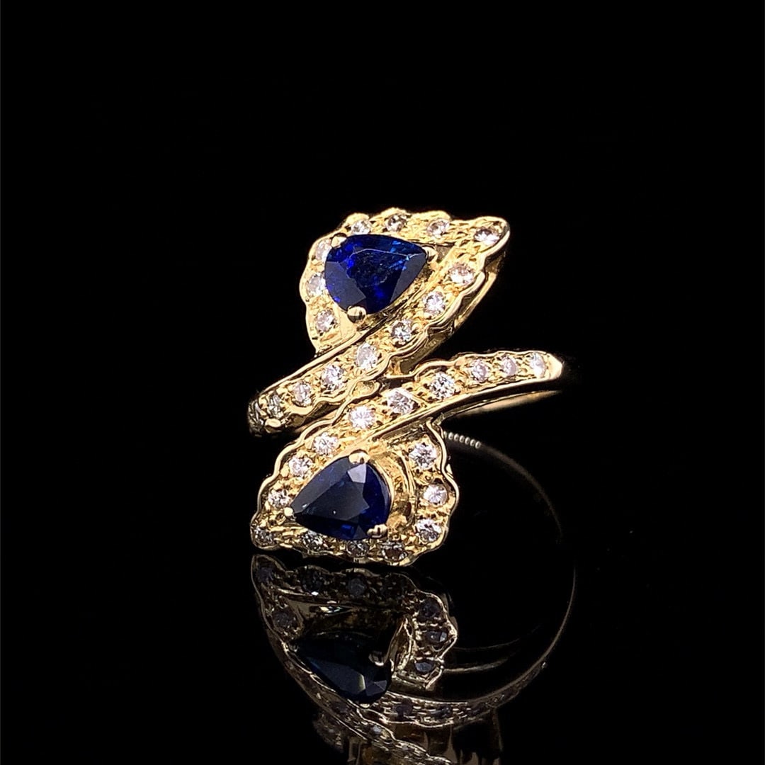14k Gold 1.38 Ctw Natural Sapphire & Diamond Ring: Ref:230990008 // gold content:14k gold // ring size:7. 25us // // main gemstone:sapphire // shape:pear // carat weight:0. 99ct // color:blue // treatment:natural // // adjacent gemstone 2 : diamond