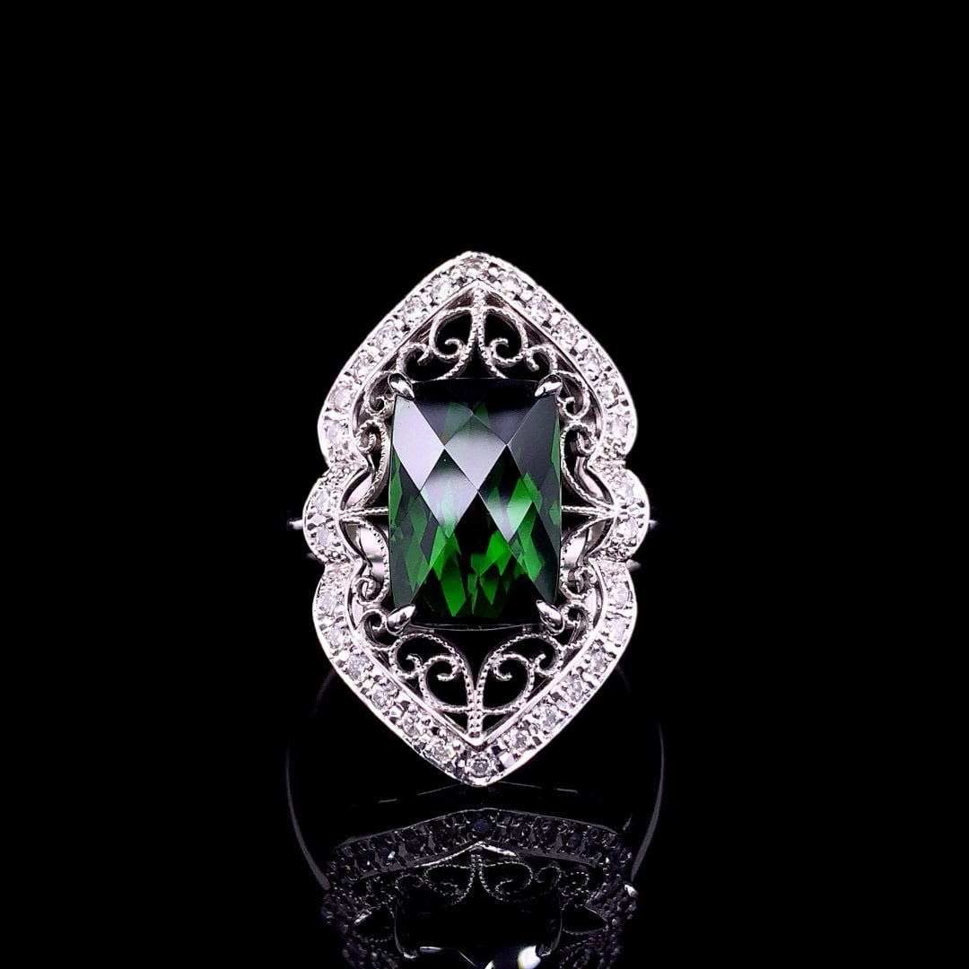 14k Gold 6.75 Ctw Natural Tourmaline & Diamond Ring: Ref:230990027 // gold content:14k gold // ring size:7. 25us // // main gemstone:tourmaline // shape:cushion // carat weight:6. 34ct // color:green // treatment:natural // // adjacent gemstone 2 :