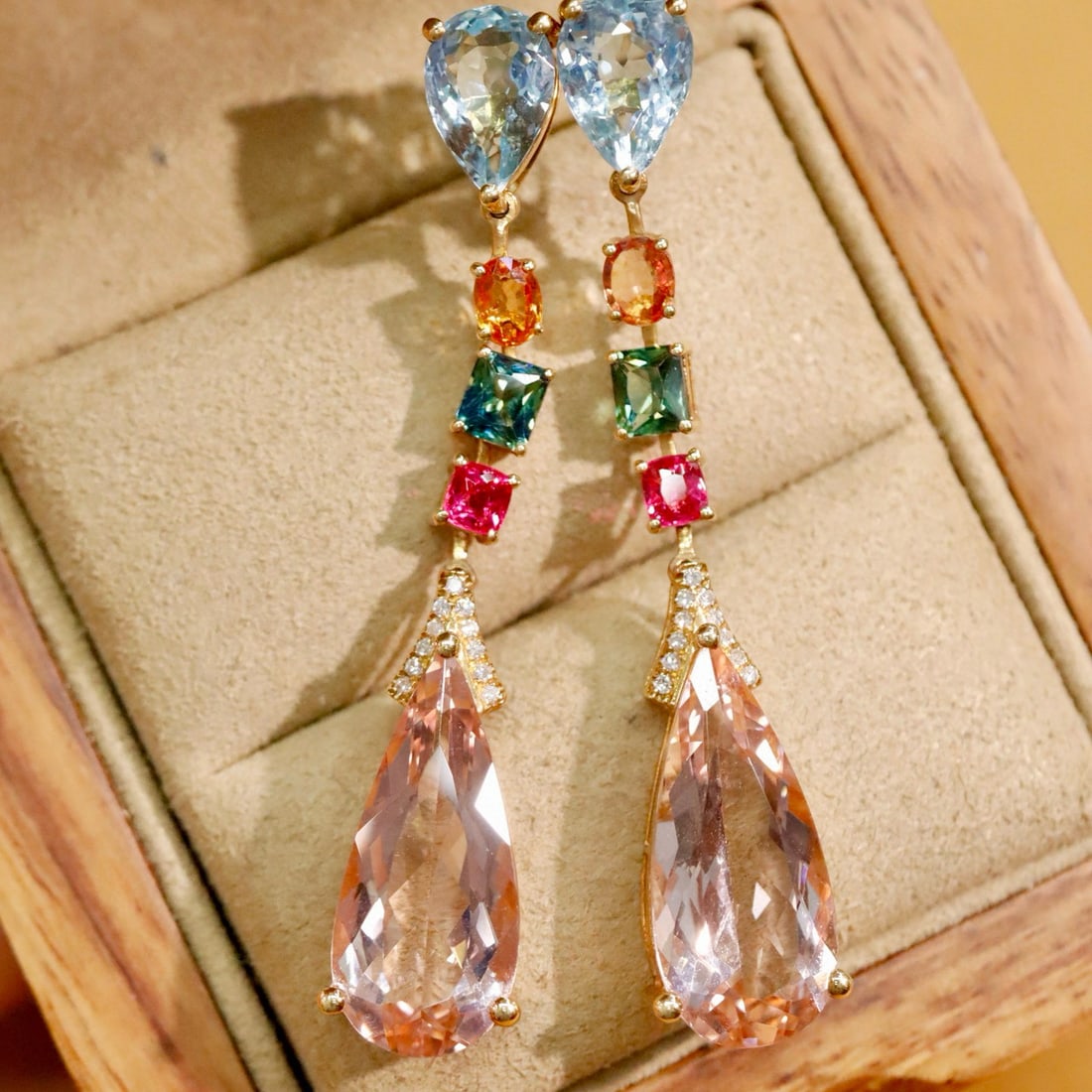 14k Gold 10.42 Ctw Natural Morganite & Diamond Earrings: Ref:230990035 // gold content:14k gold // main gemstone:morganite // shape:pear // carat weight:10. 33ct // color:orange // treatment:natural // // adjacent gemstone 2 : diamond // shape:round //