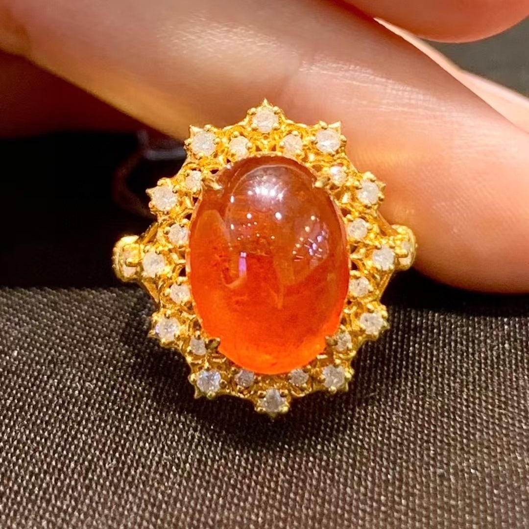 14k Gold 9.05 Ct Natural Spessartine & Diamond Ring: Ref:230990039 // gold content:14k gold // ring size:7. 25us // // main gemstone:spessartine // shape:oval // carat weight:9. 05ct // color:orange // treatment:natural // // adjacent gemstone 2 :