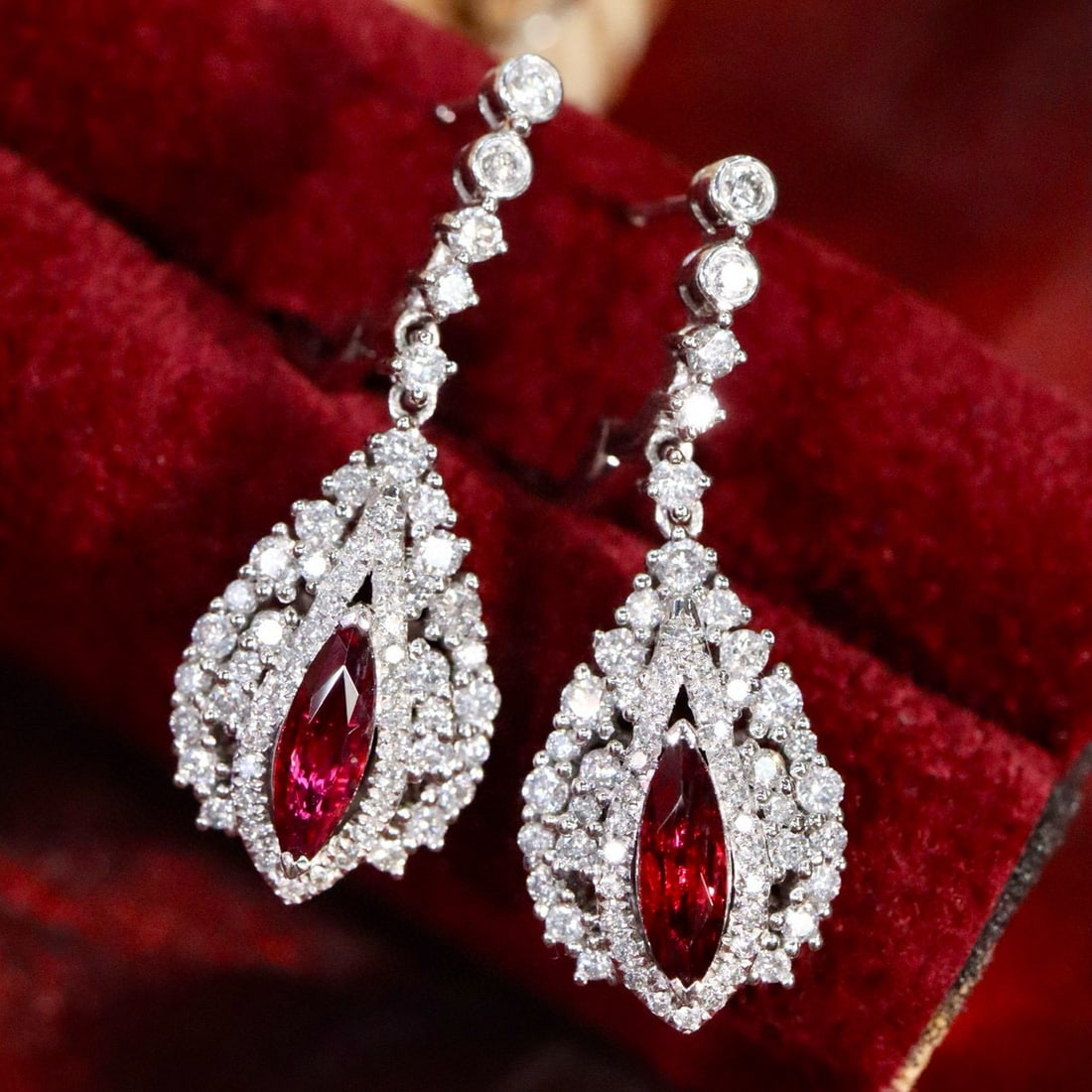 14k Gold 2.28 Ctw Natural Ruby & Diamond Earrings: Ref:230990050 // gold content:14k gold // main gemstone:ruby // shape:marquise // carat weight:1. 0ct // color:pigeonblood red // treatment:natural // // adjacent gemstone 2 : diamond // shape:multipl