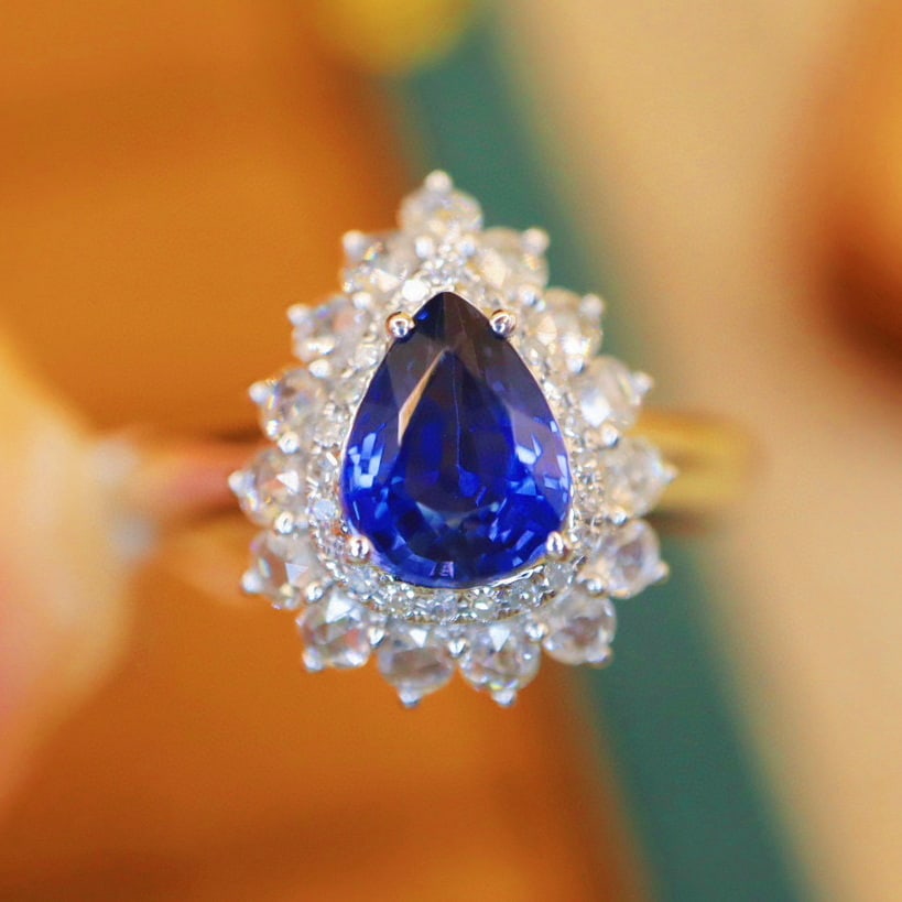 14k Gold 1.69 Ctw Natural Sapphire & Diamond Ring: Ref:230990067 // gold content:14k gold // ring size:7. 25us // // main gemstone:sapphire // shape:pear // carat weight:1. 25ct // color:blue // treatment:natural // // adjacent gemstone 2 : diamond