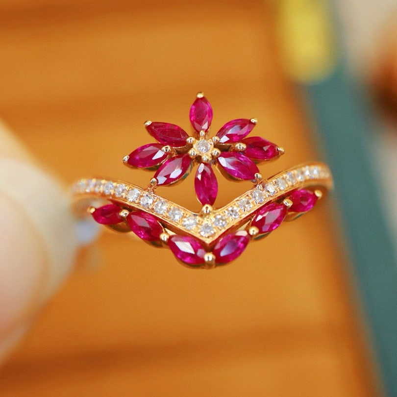 14k Gold 0.65 Ctw Natural Ruby & Diamond Ring: Ref:230990068 // gold content:14k gold // ring size:7. 25us // // main gemstone:ruby // shape:marquise // carat weight:0. 57ct // color:red // treatment:natural // // adjacent gemstone 2 : diamond //