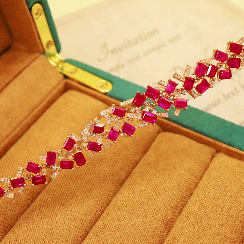 14k Gold 12.47 Ctw Natural Ruby & Diamond Bracelet: Ref:230990069 // gold content:14k gold // main gemstone:ruby // shape:rectangle // carat weight:11. 83ct // color:pigeonblood red // treatment:natural // // adjacent gemstone 2 : diamond // number of 
