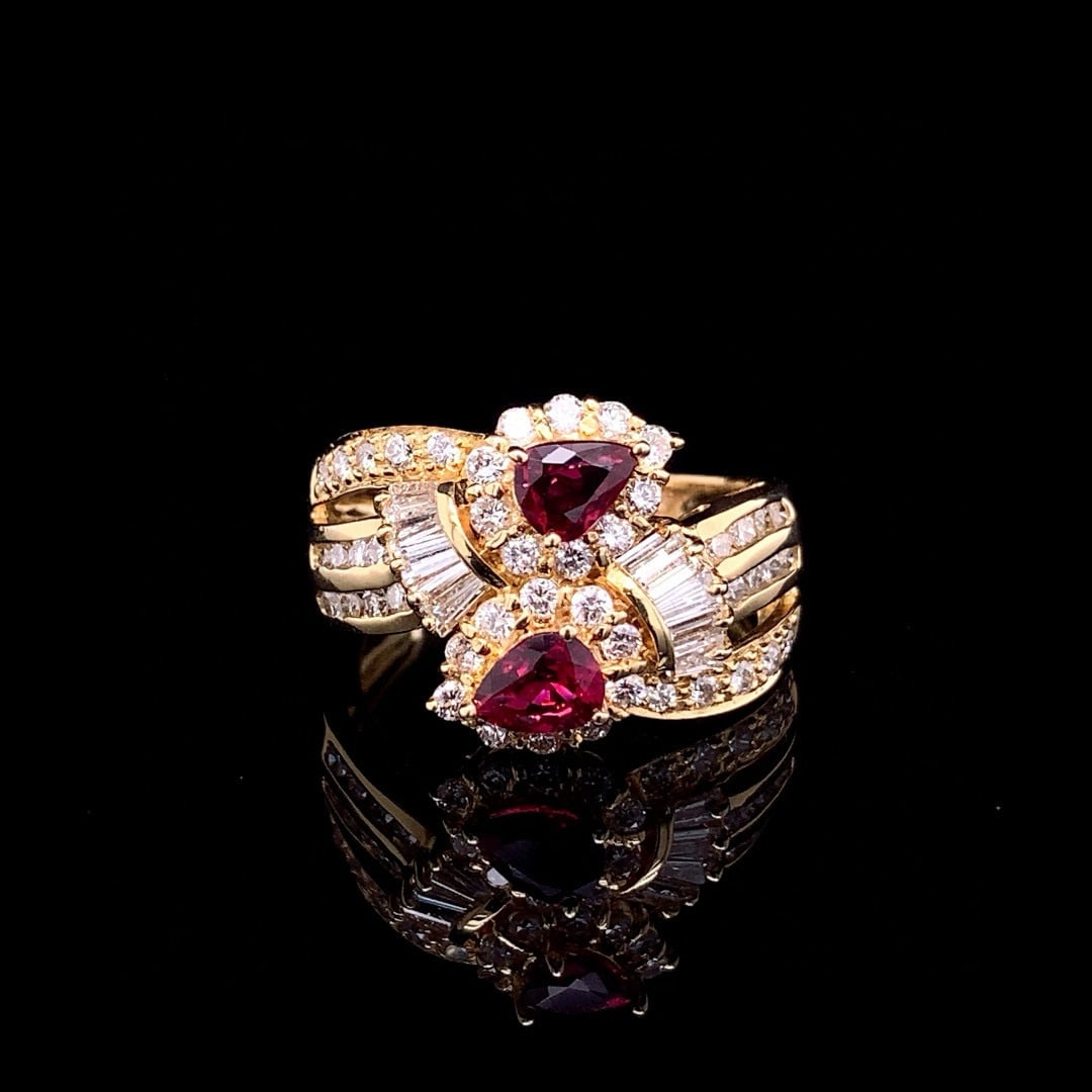 14k Gold 1.66 Ctw Natural Ruby & Diamond Ring: Ref:230990074 // gold content:14k gold // ring size:7. 25us // // main gemstone:ruby // shape:pear // carat weight:0. 66ct // color:red // treatment:natural // // adjacent gemstone 2 : diamond //