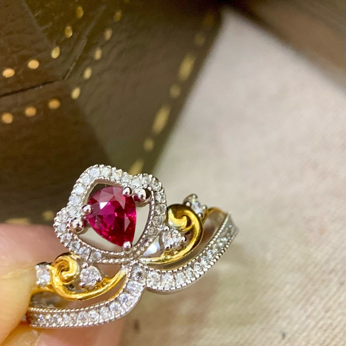 14k Gold 0.59 Ctw Natural Ruby & Diamond Ring: Ref:230990121 // gold content:14k gold // ring size:7. 25us // // main gemstone:ruby // shape:pear // carat weight:0. 38ct // color:red // treatment:natural // // adjacent gemstone 2 : diamond //