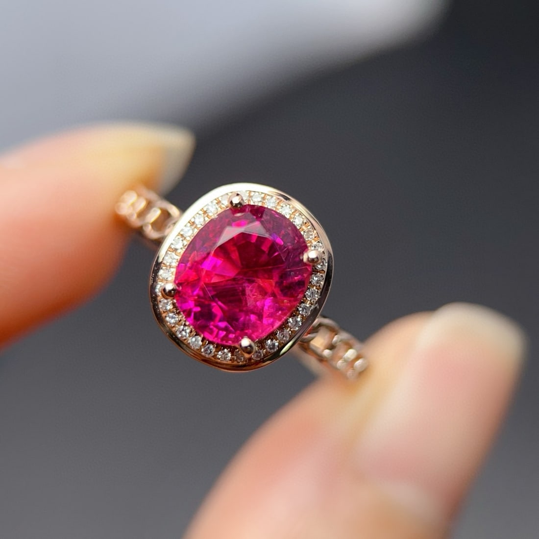 14k Gold 2.18 Ct Natural Tourmaline & Diamond Ring: Ref:230990183 // gold content:14k gold // ring size:7. 25us // // main gemstone:tourmaline // shape:oval // carat weight:2. 18ct // color:red // treatment:natural // // adjacent gemstone 2 : diamond