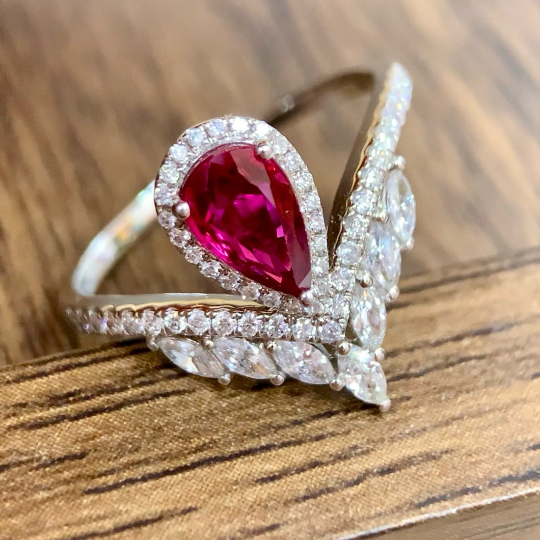 14k Gold 1.22 Ctw Natural Ruby & Diamond Ring: Ref:230990192 // gold content:14k gold // ring size:7. 25us // // main gemstone:ruby // shape:pear // carat weight:0. 82ct // color:red // treatment:natural // // adjacent gemstone 2 : diamond //