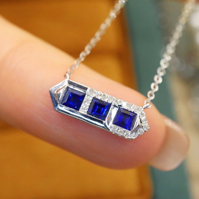 14k Gold 0.53 Ctw Natural Sapphire & Diamond Necklace: Ref:230990196 // gold content:14k gold // main gemstone:sapphire // shape:square // carat weight:0. 48ct // color:blue // treatment:natural // // adjacent gemstone 2 : diamond // number of stones:19