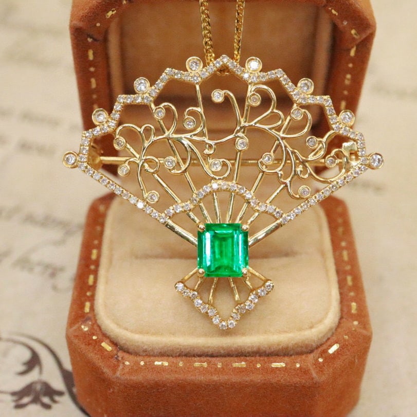 14k Gold 1.28 Ctw Vivid Green Natural Emerald & Diamond Brooch/pendant( Without Chain ): Ref:230990218 // gold content:14k gold // main gemstone:emerald // shape:octagonal // carat weight:0. 85ct // color:vivid green // treatment:natural // // adjacent gemstone 2 : diamond // number of