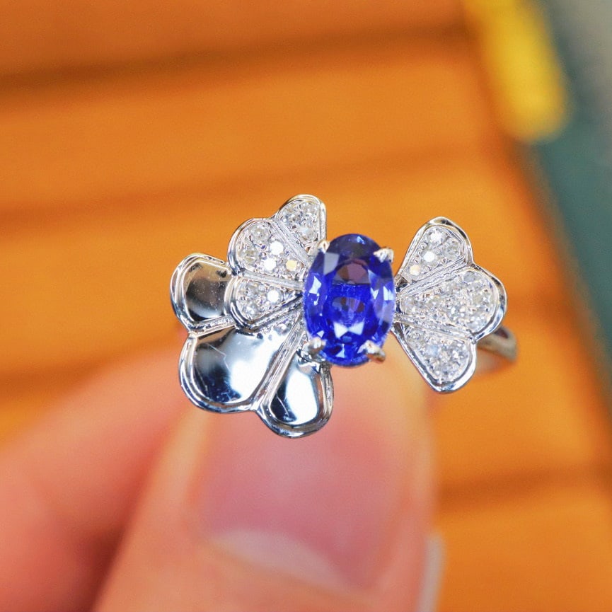 14k Gold 0.83 Ctw Natural Sapphire & Diamond Ring: Ref:230990225 // gold content:14k gold // ring size:7. 25us // // main gemstone:sapphire // shape:oval // carat weight:0. 75ct // color:blue // treatment:natural // // adjacent gemstone 2 : diamond