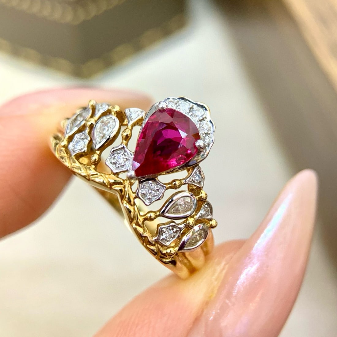 14k Gold 0.97 Ctw Natural Ruby & Diamond Ring: Ref:230990238 // gold content:14k gold // ring size:7. 25us // // main gemstone:ruby // shape:pear // carat weight:0. 81ct // color:red // treatment:natural // // adjacent gemstone 2 : diamond //
