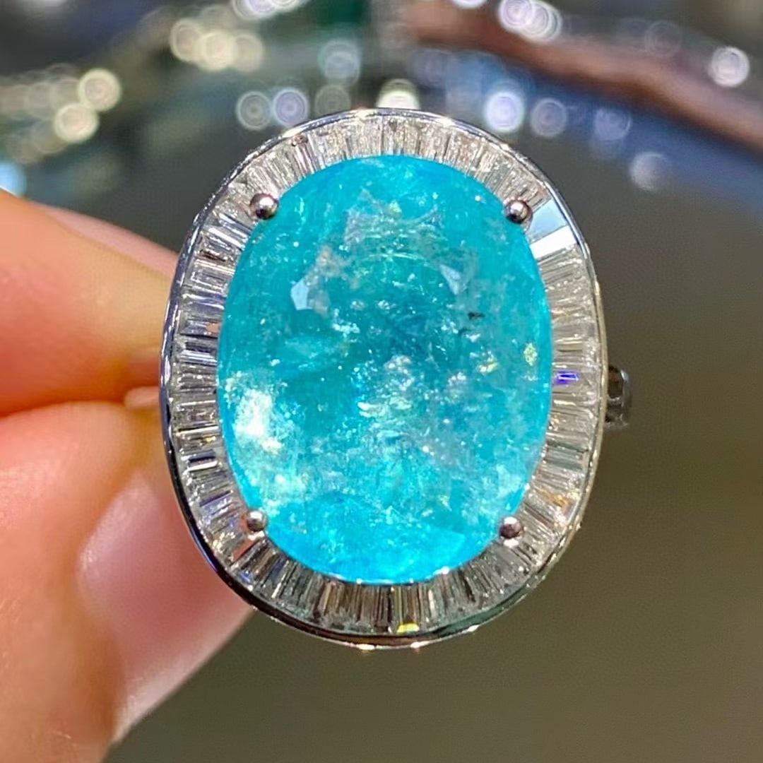 14k Gold 6.6 Ct Natural Paraiba Tourmaline & Diamond Ring: Ref:230990277 // gold content:14k gold // ring size:7. 25us // // main gemstone:paraiba tourmaline // shape:oval // carat weight:6. 6ct // color:blue // treatment:natural // // adjacent gemstone 2 : d