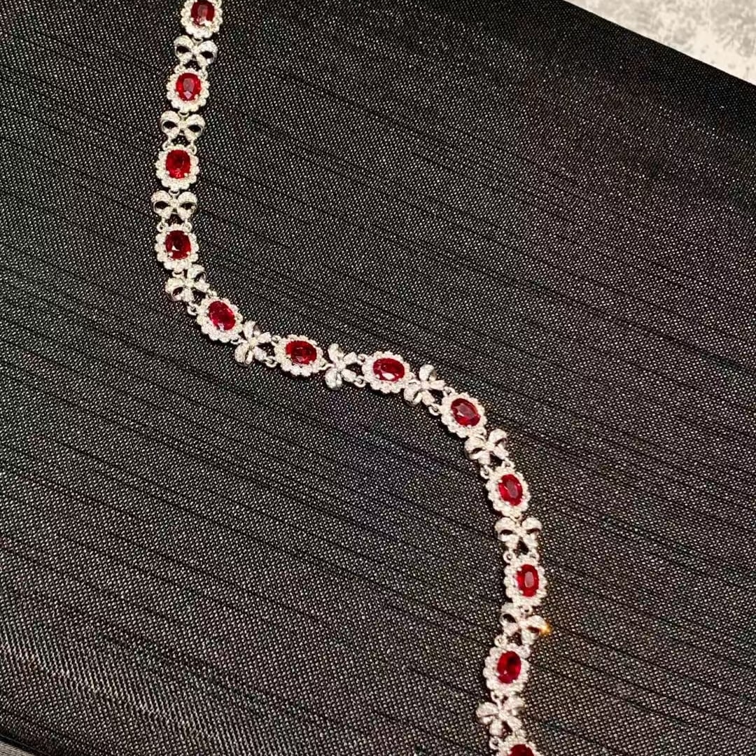 14k Gold 7.1 Ct Natural Ruby & Diamond Bracelet: Ref:230990282 // gold content:14k gold // main gemstone:ruby // shape:oval // carat weight:7. 1ct // color:pigeonblood red // treatment:natural // // adjacent gemstone 2 : diamond // shape:round //