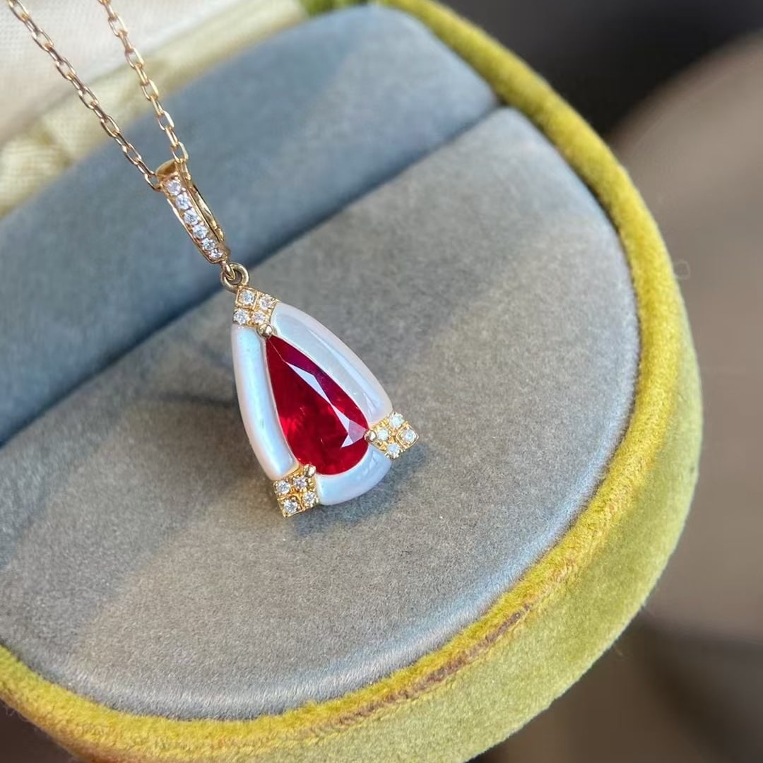 14k Gold 1.21 Ct Natural Ruby & Diamond Pendant( Without Chain ): Ref:230990323 // gold content:14k gold // main gemstone:ruby // shape:pear // carat weight:1. 21ct // color:pigeonblood red // treatment:natural // // adjacent gemstone 2 : diamond // shape:round //