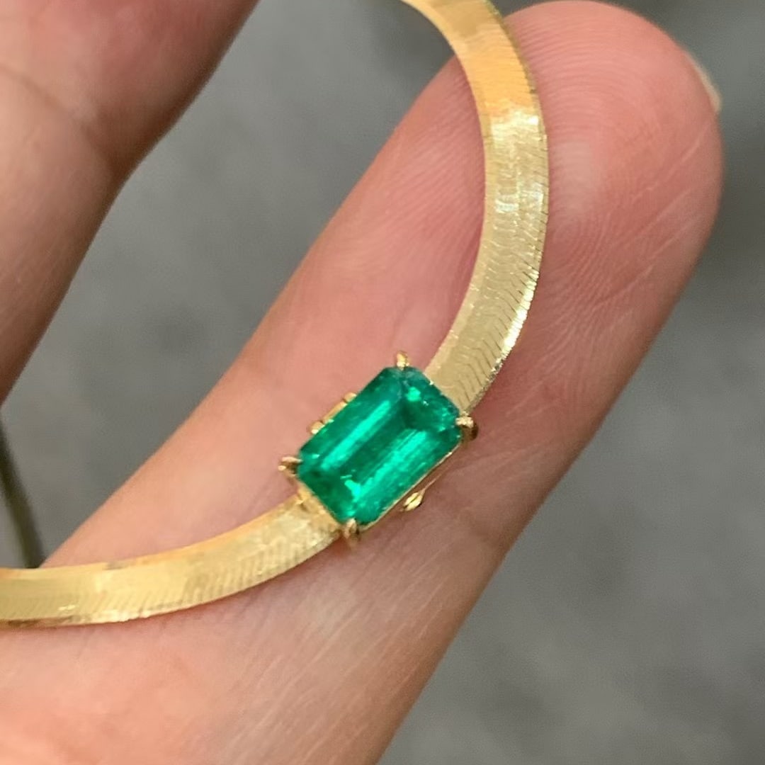14k Gold 0.5 Ct Vivid Green Natural Emerald Necklace: Ref:230990335 // gold content:14k gold // main gemstone:emerald // shape:octagonal // carat weight:0. 5ct // color:vivid green // treatment:natural // Condition: New Low Estimate: 4000 High Estimate: