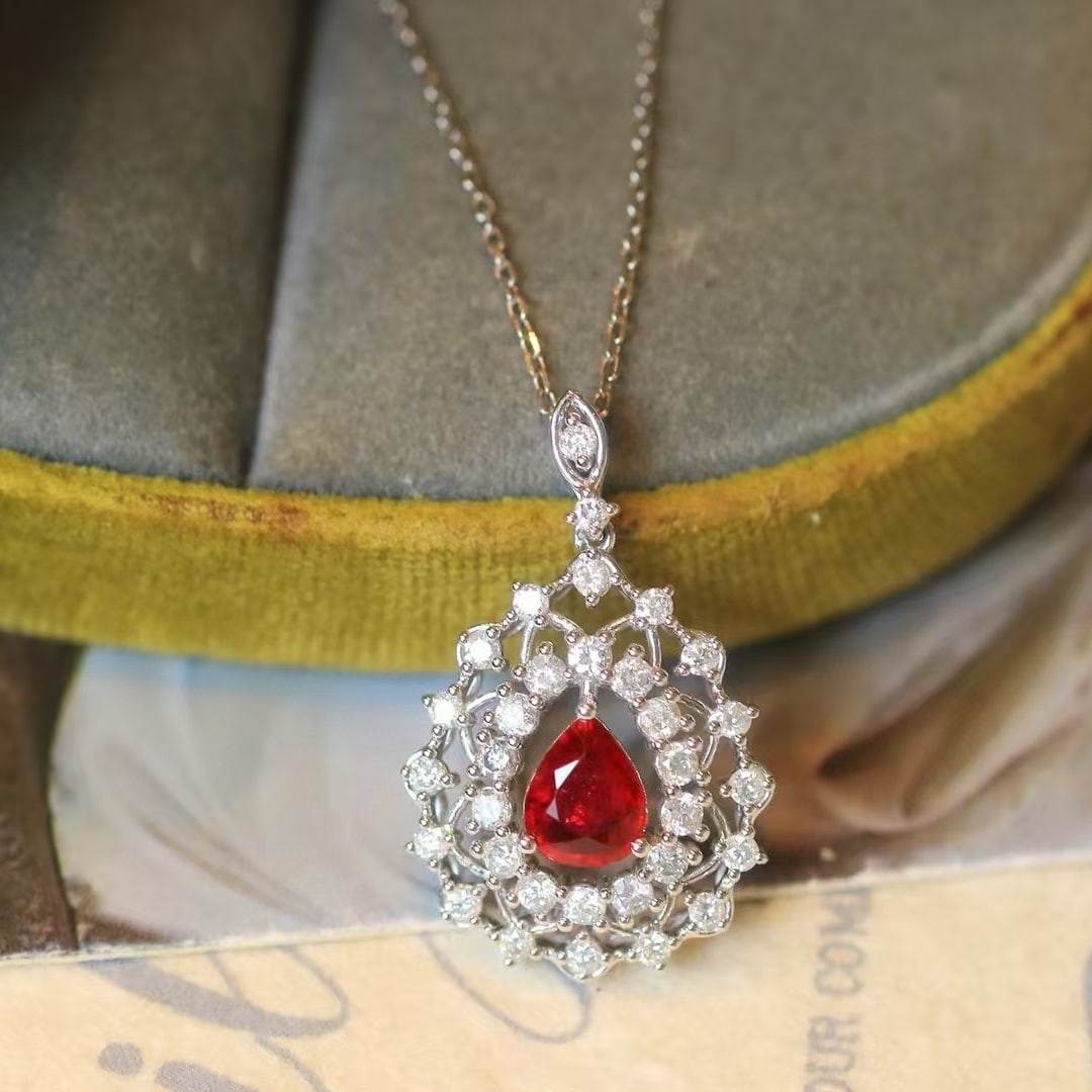 14k Gold 1.22 Ctw Natural Ruby & Diamond Pendant( Without Chain ): Ref:230990380 // gold content:14k gold // main gemstone:ruby // shape:pear // carat weight:0. 6ct // color:pigeonblood red // treatment:natural // // adjacent gemstone 2 : diamond // shape:round //