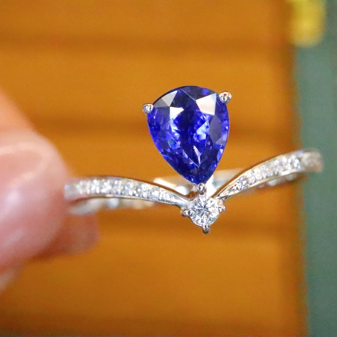 14k Gold 0.72 Ctw Natural Sapphire & Diamond Ring: Ref:230990430 // gold content:14k gold // ring size:7. 25us // // main gemstone:sapphire // shape:pear // carat weight:0. 63ct // color:royal blue // treatment:natural // // adjacent gemstone 2 :