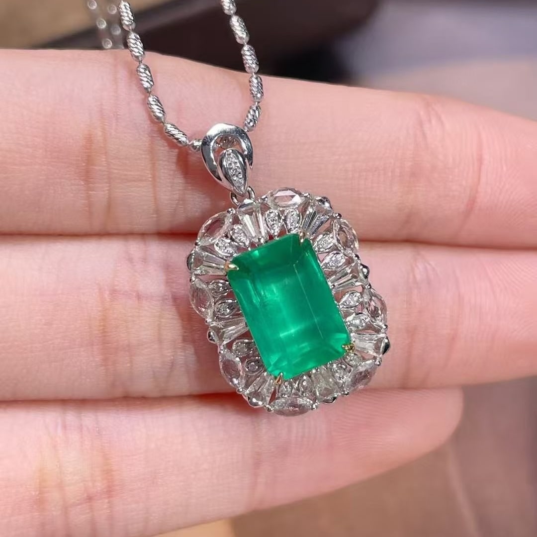 14k Gold 3.77 Ctw Natural Emerald & Sapphire Pendant( Without Chain ): Ref:230990435 // gold content:14k gold // main gemstone:emerald // shape:octagonal // carat weight:2. 65ct // color:green // treatment:natural // // adjacent gemstone 2 : sapphire // shape:multiply