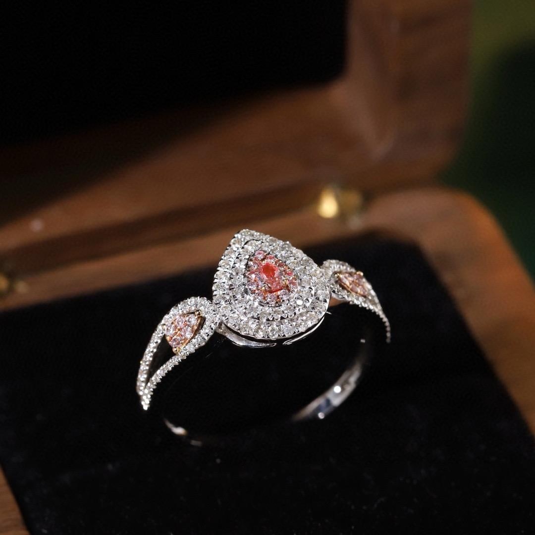 14k Gold 0.45 Ctw Natural Pink Diamond & Diamond Ring: Ref:231155103 // gold content:14k gold // ring size:7. 25us // // main gemstone:pink diamond // shape:pear // carat weight:0. 07ct // color:pink // treatment:natural // // adjacent gemstone 2 :