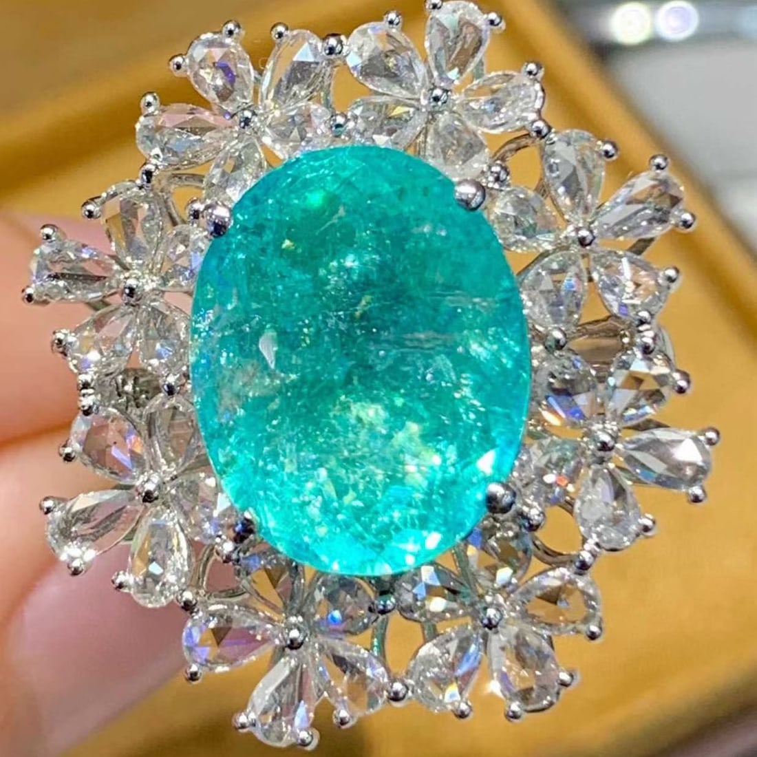 14k Gold 6.68 Ct Natural Paraiba Tourmaline & Diamond Ring: Ref:231155159 // gold content:14k gold // ring size:7. 25us // // main gemstone:paraiba tourmaline // shape:oval // carat weight:6. 68ct // color:blue // treatment:natural // // adjacent gemstone 2 : 
